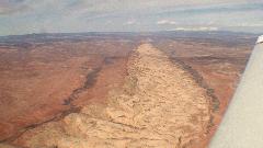 Comb Ridge, Utah, as seen from above Bluff airport (66V). Comb Ridge is an immense sandstone formation tilted at an angle of about 20 degrees, which is almost 80 miles (128 km) long running north and south, and about one mile (1.6 km) wide. Image01.jpg